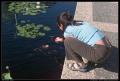 lizzie_feeding_fish